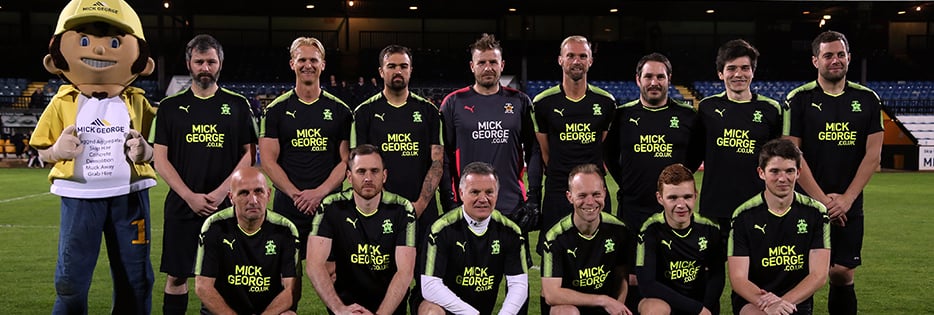 cambridge united mick george charity match